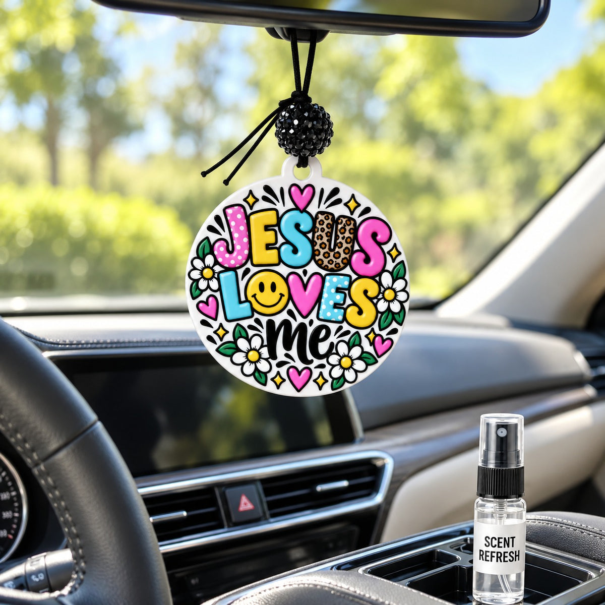 Jesus Loves Me car freshie hanging in a car